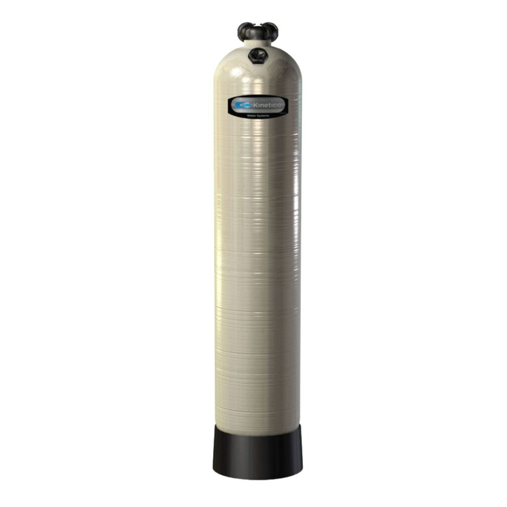Kinetico Neutralizer system with tall thin ivory-colored tank