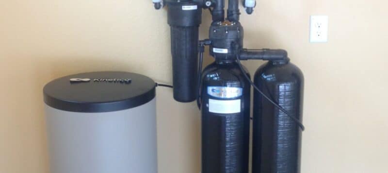 kinetico water softener installed in a garage