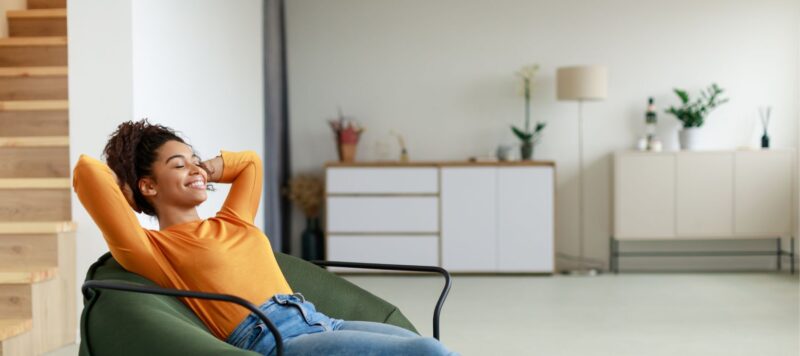 woman relaxing in her home